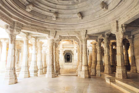 Ranakpur Jain temple or Chaturmukha Dharana Vihara is a Jain temple in Rajasthan, India. The temple built using white marble, with 1444 pillars, 80 domes and 426 columns all intricately carved and unique. This is one of the largest and most important temples of Jain culture.の写真素材