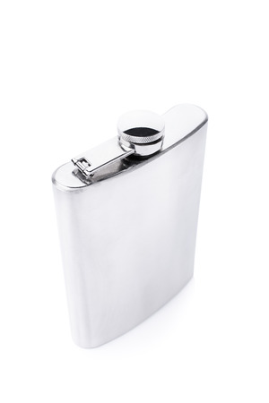 Close-up shot of a stainless steel flask isolated on white backgroundの写真素材