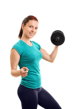I pull my weight. Do you? Young girl lifting weights and pointing towards you isolated on white backgroundの写真素材