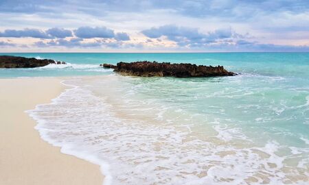 Beautiful wavy turquoise beachc in the Caribbean, at cayo Santa Maria.の写真素材