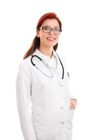 Close up of a confident and smiling young female doctor with a  stethoscope, isolated on white background.の写真素材