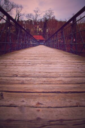 Low angle view of the Two Penny bridge (ZweiffennigsbrÃ¼cke) with metal railing over the Fulda River in Melsungen, Germany.の写真素材