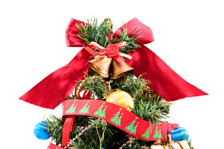 Close up of shot of the top of a decorated Christmas tree, isolated on white background. Christmas, winter, new year concept.の写真素材