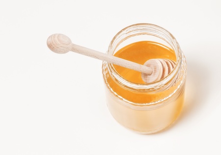 honey with spoonの写真素材