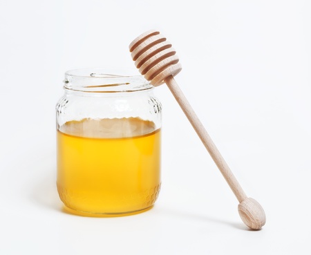 honey with spoonの写真素材