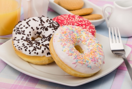 Donuts on white plateの写真素材