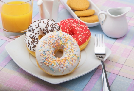Donuts on white plateの写真素材