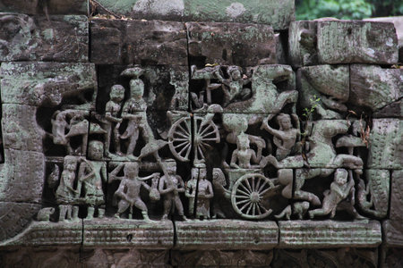 Carved stone at Angkor Wat in Cambodiaの写真素材