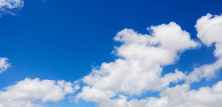 blue sky with white cloud backgroundの写真素材