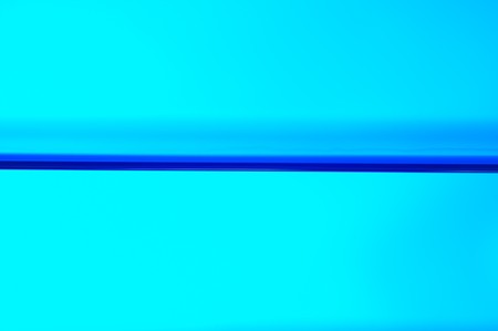 Blue calm water without any wave or drop の写真素材