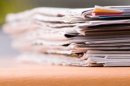 Some newspaper to be read or to do something usefull with.