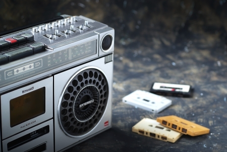 The retro radio with  a cassettes  on dark backgroundの写真素材