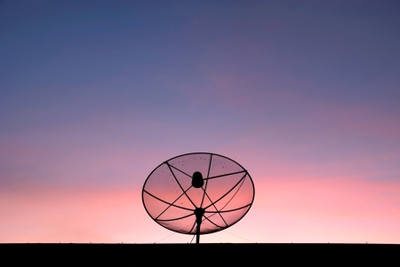 A silhouette satellite dish with beautiful backgroundの写真素材