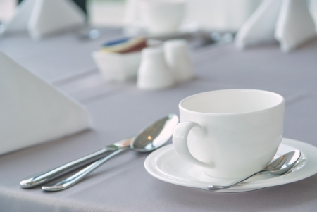  A cup of tea with accessories on breakfast tableの写真素材