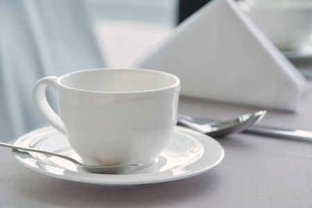  A cup of tea with accessories on breakfast tableの写真素材