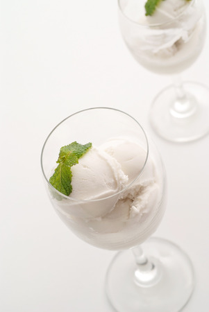 Coconut milk icecream in glasses on white backgroundの写真素材
