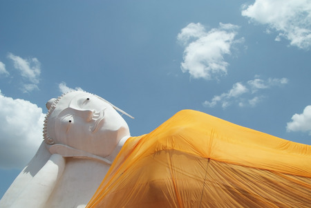 The big buddha statue below the blue skyの写真素材