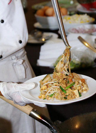 Fried noodle or called Padthai in Thailand is ready for serve by chefの写真素材