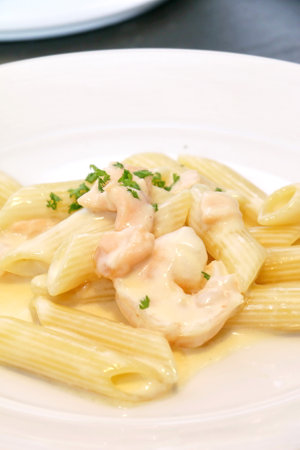Pasta carbonara with shrimp ready for serve in the partyの写真素材