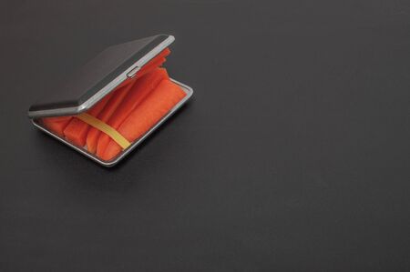 Cigarette case with carrot slices Concept of quitting smoking, healthy lifestyleの写真素材