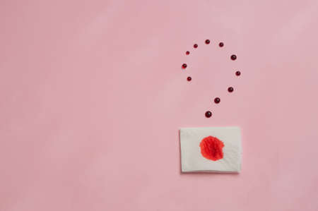 Metaphor of the anus on a pink background. concept of the cause rectal bleedingの写真素材