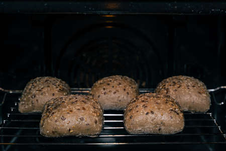 Freshly baked multigrain rolls in the oven