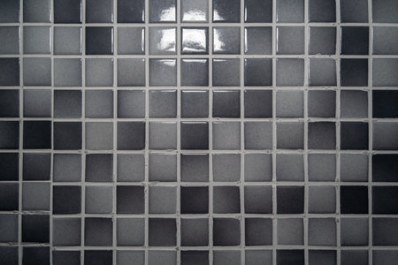 Light gray and dark gray mosaic tiles wallの写真素材