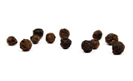 Pepper grains isolated on white backgroundの写真素材