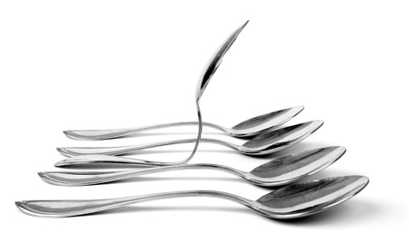 Stand up concept wiht spoonsの写真素材