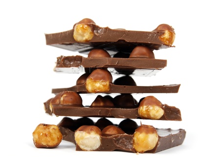 Chocolate pieces with nut isolated on white background 
の写真素材