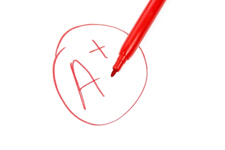 A plus on a test paper の写真素材