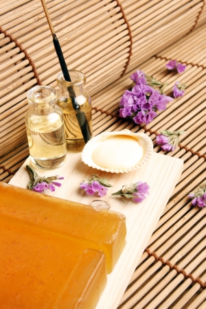 Nice spa arrangement with soap, flowers, aromatic oils and shell 
の写真素材