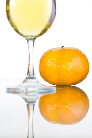 wine with oranges isolated on  white backgroundの写真素材