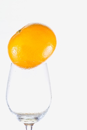 wine with oranges isolated on  white backgroundの写真素材