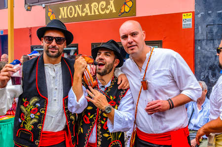 Everywhere in Tenerife these folk festivals are celebrated with music and dance. In the regional costume, with decorated wagons pulled by oxen, people move through the village.のeditorial素材