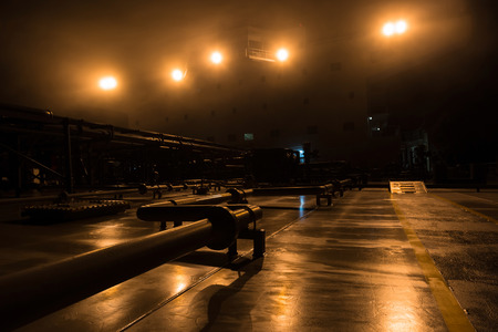Night view of oil tanker deck with cargo facilitiesの写真素材