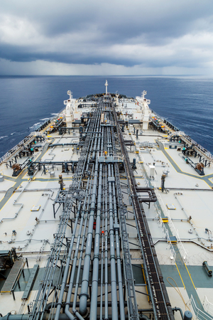 Oil tanker deck with pipeline for oil transfer.の写真素材