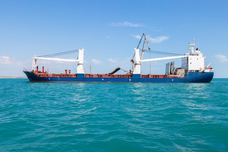 Dry cargo vessel at anchor.