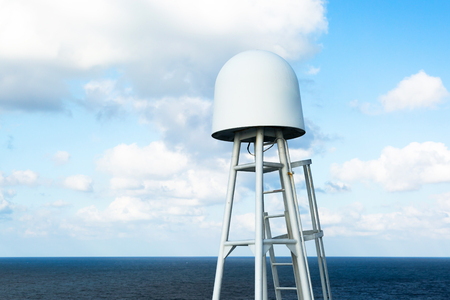Satellite antenna of cargo a ship.の写真素材