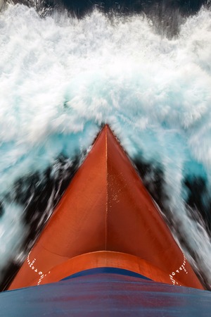 Red color bulb of the merchant vessel underway at sea.の写真素材