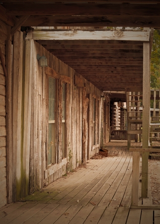 Western Sepia Old Town Sidewalk and Store Frontの写真素材