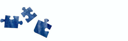 jigsaw puzzle teamwork concept disassembled on white background bannerの写真素材