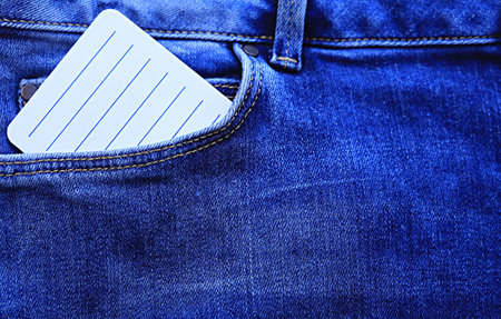empty sheet of paper for text in jeans pocketの写真素材