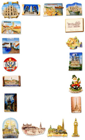 A collection of fridge magnets bought from different visited countries arranged as a vertical frameの写真素材