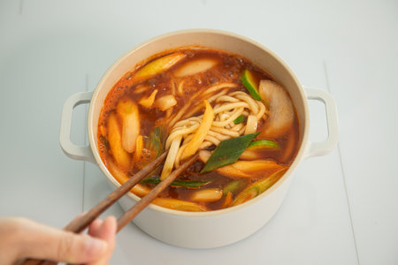 Asian noodle soup with chopsticks on white background, Thailand.の写真素材