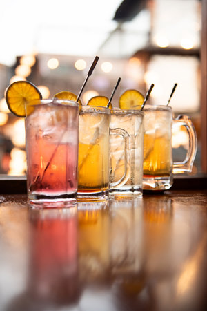 cocktails in the bar on the bar counter, selective focus.の写真素材