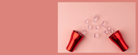 Drink can with ice cubes on pink background, top view.の写真素材