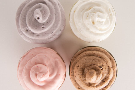 different types of meringues on a white background. top viewの写真素材