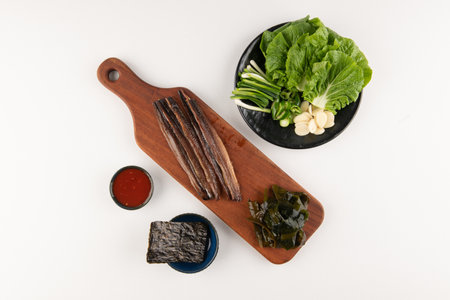 Half-dried Saury, vegetables, and sauceの写真素材