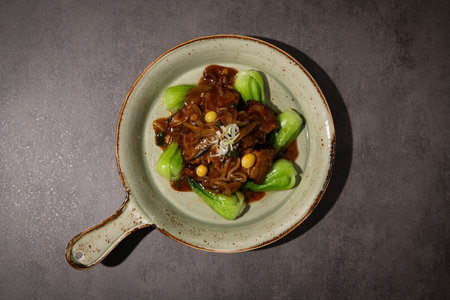 Korean food Stir-fried pork in soy sauce with kimchiの写真素材